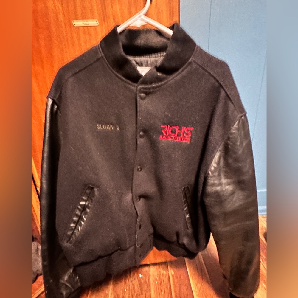 Varsity black jacket from San Diego nightclub